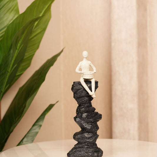 Drummer Figurine on Pillar