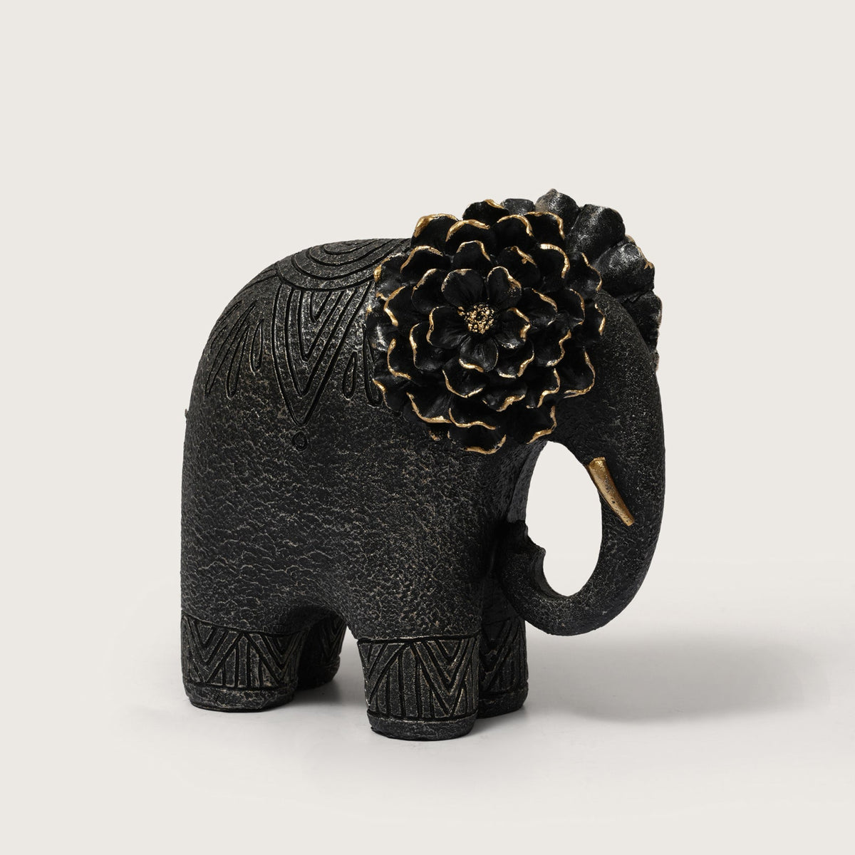 Textured Elephant Sculpture with Flower Headpiece