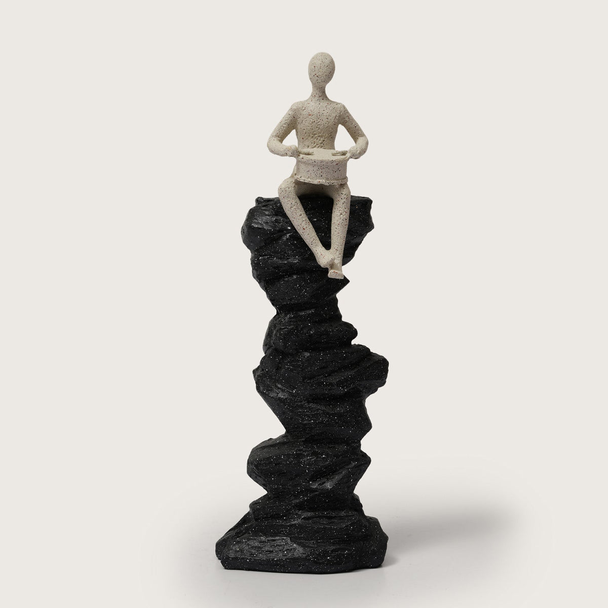 Drummer Figurine on Pillar
