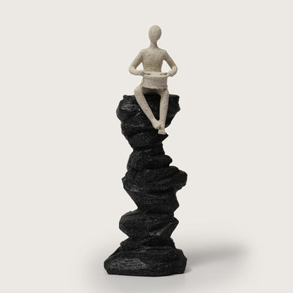 Drummer Figurine on Pillar
