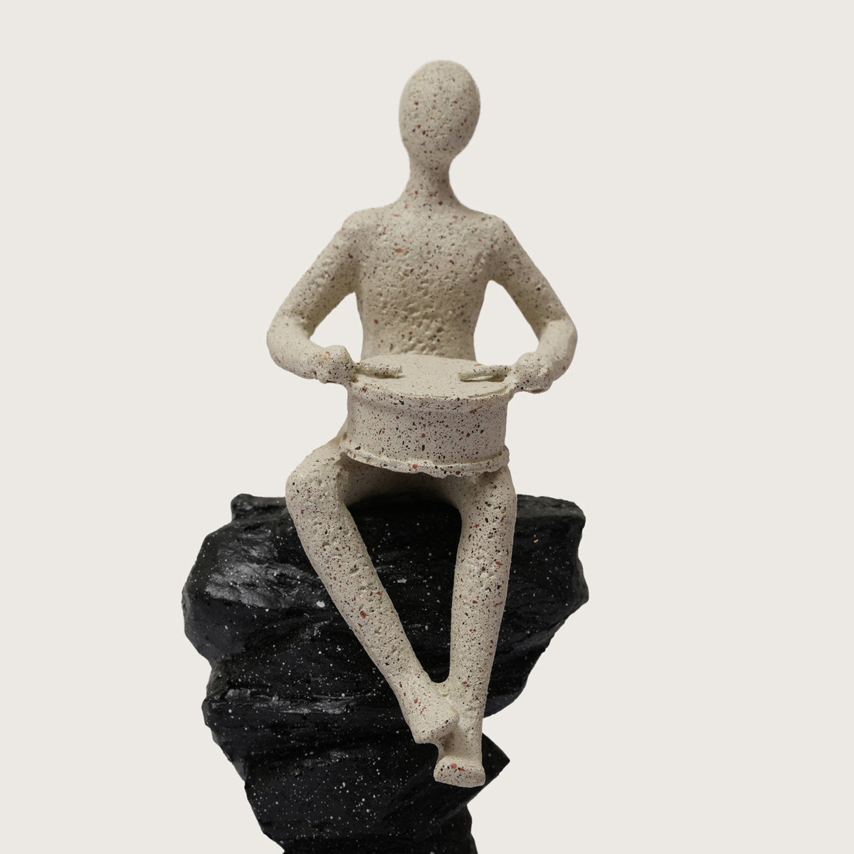 Drummer Figurine on Pillar