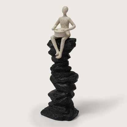Drummer Figurine on Pillar